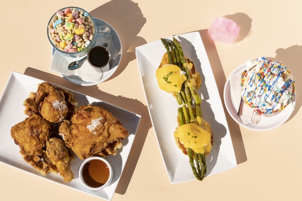 From left: Chicken and Waffles, Lucky Charm Blue Latte, The Sugar Factory Eggs Benedict, and the Pink Unicorn Hot Chocolate at Sugar Factory on Harmon Corner, Thursday, Feb. 10, 2022. YASMINA CHAVEZ