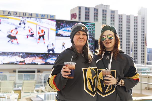 Guests enjoy complimentary cocktails and bites while catching the Golden Knights game at Circas Stadium Swim during an ELITE event Tuesday, March 8, 2022.
