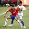 El Salvador's Roberto Molina, right, grabs the arm of Chile's Clemente Montez while vying for the ball during the second half of an international friendly soccer match Saturday, Dec. 11, 2021, in Los Angeles. Chile won 1-0. 



