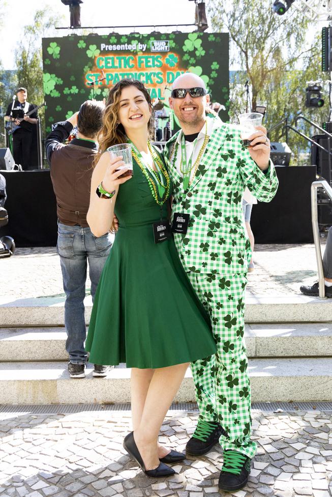 Kat, left, and David Neild pose for a photo in their festive outfits during the St. Patricks Day Celtic Feis celebration at the New York New York Hotel and Casino Thursday, March 17, 2022. YASMINA CHAVEZ