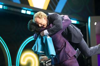 Utah linebacker Devin Lloyd lifts NFL Commissioner Roger Goodell after being chosen by the Jacksonville Jaguars with the 27th pick of the NFL football draft Thursday, April 28, 2022.