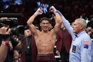 Dmitry Bivol, of Kyrgyzstan, reacts after winning a light heavyweight title boxing match against Canelo Alvarez, of Mexico, Saturday, May 7, 2022, in Las Vegas.