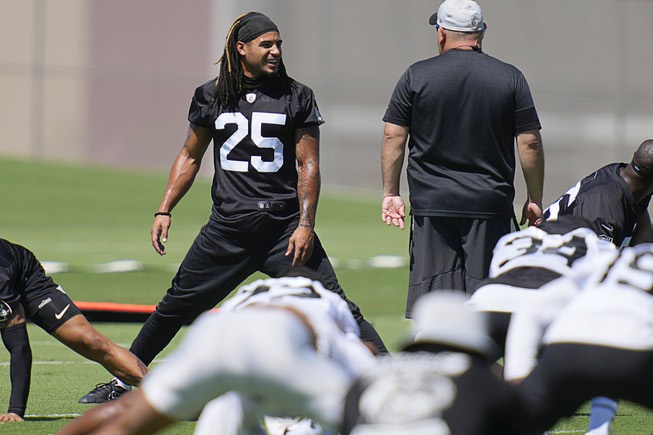 Las Vegas Raiders safety Tre'von Moehrig warms up at the NFL football team's practice facility Tuesday, June 7, 2022, in Henderson, Nev.