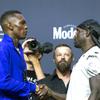 UFC middleweight champion Israel Adesanya, left, shakes hands with challenger Jared Cannonier during a UFC 276 news conference at T-Mobile Arena Thursday, June 30, 2022. UFC 276 takes place at the arena on Saturday.