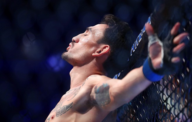 Max Holloway waits for the start of his fight against UFC featherweight champion Alexander Volkanovski during UFC 276 at T-Mobile Arena Saturday July 2, 2022. Volkanovski retained his title by unanimous decision.