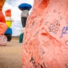 Seven Magic Mountains, shown in this July 14, 2022 photo, could be losing its “Instagrammable” appeal with graffiti and stickers sprawled across the boulders, and excess garbage seemingly everywhere.

