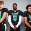 Members of the Rancho High School football team are pictured during the Las Vegas Sun's high school football media day at the Red Rock Resort on July 26, 2022. They include, from left, Hudson Lile, Maurion Preston and Fatu Sio.