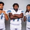 Members of the Basic High School football team are pictured during the Las Vegas Sun's high school football media day at the Red Rock Resort on July 26, 2022. They include, from left, Anthony Sanitoa, Domingo Cleveland and Marcellus Moore.