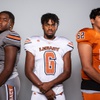 Members of the Legacy High School football team are pictured during the Las Vegas Sun's high school football media day at the Red Rock Resort on July 26, 2022. They include, from left, Emekka Nsofor, Micah McGirt and Damien Felix.