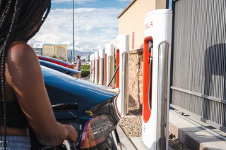 Nicole Clarkson unplugs her Tesla Model 3, after a quick charge at the busy Town Square Tesla charging station, off of Las Vegas Blvd. Monday, September 12, 2022.
