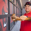 Las Vegas High School head football coach Erick Capetillo poses with Sir Herkimer's Bone at the school Wednesday, Sept. 14, 2022. The Bone Game, a rivalry football game between Rancho High and Las Vegas High School, started in 1957.