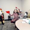 Charlotte Torgerson, 5, poses in the Play Room during the opening of UNLV's PRACTICE mental health satellite clinic Wednesday, Oct. 19, 2022. Christina Saliba, a research assistant, is at left.