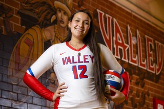 Volleyball player Taela Elliot poses for a photo at Valley High School Monday, Nov. 14, 2022.