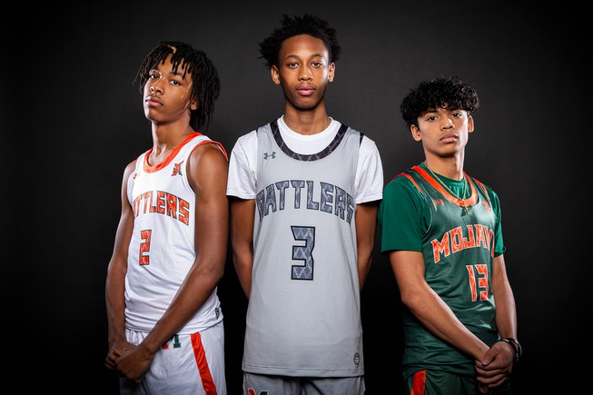 Players of the Mojave High basketball team, from left Giali Chapman, C.J. Shaw and Nathan Sherrard, take a portrait during the Las Vegas Sun's High School Basketball Media Day, Nov. 2, 2022.
