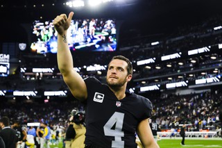 Las Vegas Raiders quarterback Derek Carr (4) gestures to his fans after the Las Vegas Raiders defeat the Los Angeles Chargers, 27-20, during an NFL football game at Allegiant Stadium Sunday, Dec. 4, 2022.