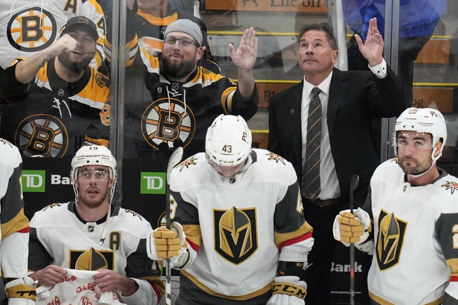 Vegas Golden Knights head coach Bruce Cassidy acknowledges applause, while honored in a video tribute for his previous career as head coach of the Boston Bruins on Monday, Dec. 5, 2022, in Boston. Cassidy was Bruins head coach from February 2017 until June 2022. 


