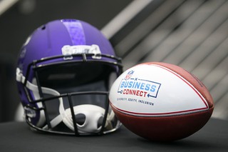 A football is displayed during a news conference promoting NFL Business Connect at Allegiant Stadium Wednesday, Dec. 14, 2022. The program is designed to help connect local diverse businesses with Super Bowl vendor contract opportunities. Super Bowl LVIII will take place in Las Vegas in February of 2024.