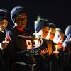 Diamondbacks varsity flag football player Lillian Felise, second from left, cries during a candlelight vigil for Ashari Hughes at Desert Oasis High School Jan. 11, 2023. Hughes, a 16-year-old sophomore died following her flag football game on Jan. 5, 2023.
