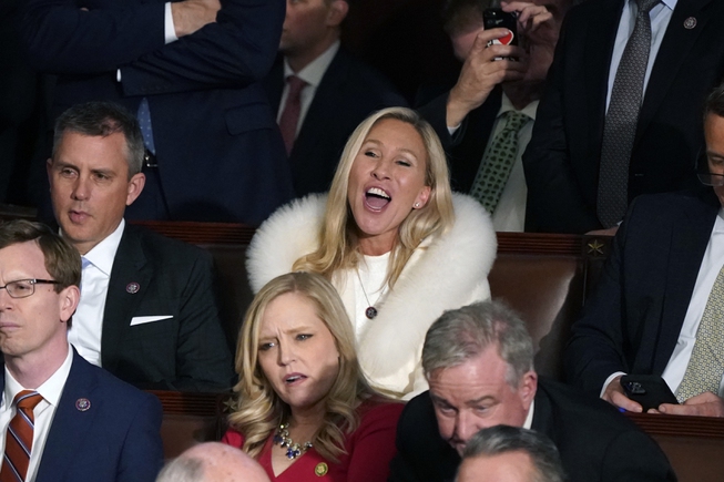 Rep. Majorie Taylor Greene, R-Ga., center, listens and reacts as President Joe Biden delivers his State of the Union speech to a joint session of Congress, at the Capitol in Washington, Tuesday, Feb. 7, 2023. 


