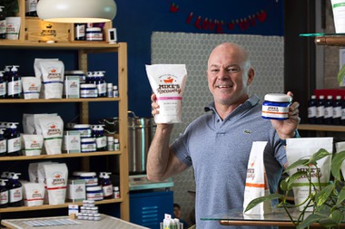 Michael Buckham poses at Mike’s Recovery in Fergusons Downtown, 1028 E. Fremont St., Wednesday, Feb. 15, 2023. Buckham started the natural health product brand in 2016, creating his own soaps, salts, balms and other products focused on recovery for athletes and active individuals.