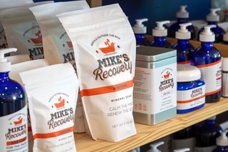 Products line a shelf at Mike's Recovery in Fergusons Downtown, 1028 E. Fremont St., Wednesday, Feb. 15, 2023. Michael Buckham started the natural health product brand in 2016, creating his own soaps, salts, balms and other products focused on recovery for athletes and active individuals.