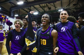 Durango Trailblazers Tylen Riley (10) celebrates with his team after they defeat the Liberty Patriots, 65-59, during a NIAA Class 5A Southern Region championship game at Liberty High School in Henderson Saturday, Feb. 18, 2023.
