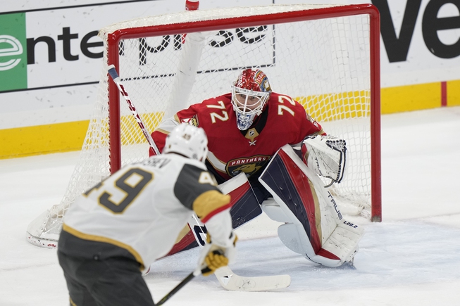 Vegas Golden Knights center Ivan Barbashev (49) attempts a shot at Florida Panthers goaltender Sergei Bobrovsky (72) during the second period Tuesday, March 7, 2023, in Sunrise, Fla. 

