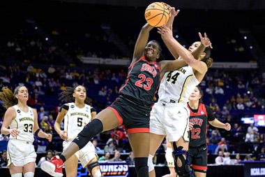 Michigan forward Cameron Williams (44) battles UNLV center Desi-Rae Young (23) for a rebound in the second half of a first-round college basketball game in the women’s NCAA Tournament in Baton Rouge, La., Friday, March 17, 2023,