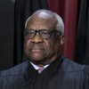 Associate Justice Clarence Thomas poses as part of a group portrait at the Supreme Court building in Washington, Oct. 7, 2022.

