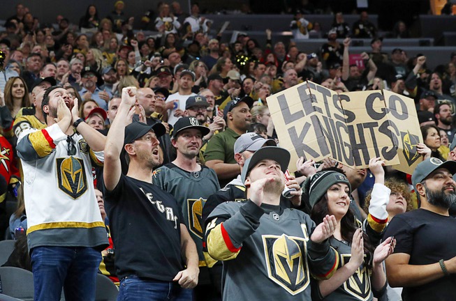 Vegas Golden Knights fans celebrate a goal by right wing Michael Amadio (22) during the first period of an NHL hockey game at T-Mobile Arena Tuesday, April 11, 2023.