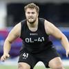 Northwestern offensive lineman Peter Skoronski runs a drill at the NFL football scouting combine in Indianapolis, Sunday, March 5, 2023. Skoronski looks like a custom-built NFL offensive lineman.