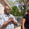 Webster Davis and his long-time neighbor Pamela Neal stand in the backyard of Davis home, pointing out all the various land and property defects that effect their neighborhood of Windsor Park in North Las Vegas, Tuesday April 18, 2023.