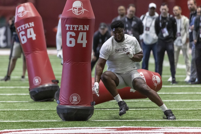Former Alabama defensive lineman Byron Young works in position drills at Alabama's NFL pro day, Thursday, March 23, 2023, in Tuscaloosa, Ala.