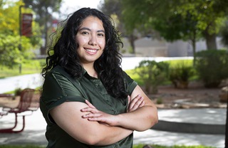 Citlally Lopez-Flores, one of UNLV's outstanding graduates, poses on UNLV campus Tuesday, May 9, 2023, in Las Vegas.