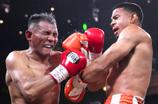Romero Wins WBA Super Lightweight Title