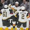 Vegas Golden Knights center Chandler Stephenson (20) is congratulated by his teammates after scoring his second goal of the game during the second period in Game 4 of the NHL hockey Stanley Cup Finals Florida Panthers, Saturday, June 10, 2023, in Sunrise, Fla.