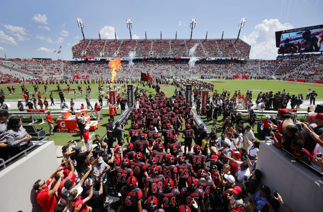 San Diego State takes the field against Arizona for an NCAA college football game Sept. 3, 2022, in San Diego. San Diego State University has sent a letter to the Mountain West seeking information related to a potential exit next year, according to a person familiar with the situation. The person spoke to The Associated Press on condition of anonymity Friday night, June 16, due to the sensitivity of the situation. 


