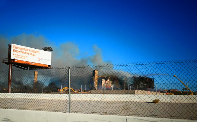 A fire burns at a multi-story apartment complex under construction near the I-215 Beltway and Durango Drive Tuesday, June 20, 2023.