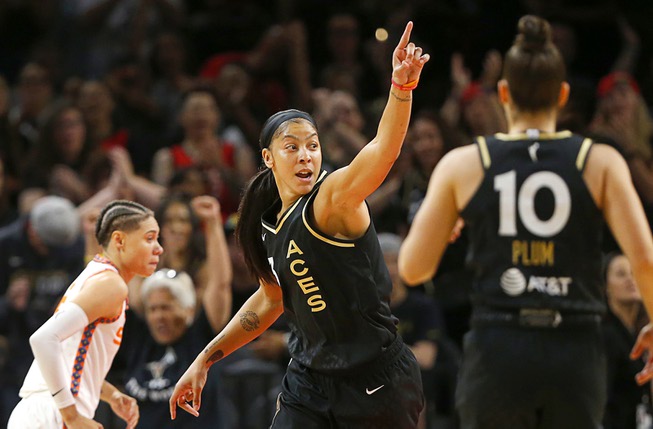 Las Vegas Aces forward Candace Parker (3) celebrates after scoring a basket against the Connecticut Sun during the first half of a WNBA basketball game Saturday, July 1, 2023, in Las Vegas.