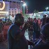 Streetside entertainer Carey Nash performs “End of the Road” by Boyz II Men for tourists July 25, 2023, on the Las Vegas Strip. Nevada has the highest unemployment rate in the country at 5.4%. State officials insist Nevada’s economy must move away from its focus on gambling and tourism.