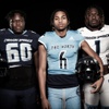 Members of the Canyon Springs High School football team are pictured during the Las Vegas Sun's high school football media day at the Red Rock Resort on July 20, 2023. They include, from left, Avyion Harper, Eric Mosley and Armando Lewis.