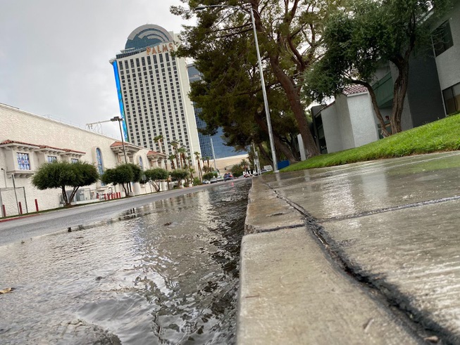 Rain was falling around the Las Vegas Strip on Friday, Aug. 18, 2023. The streets are wetted in the area near the Palms.