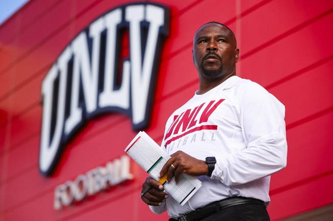 Hunkie Cooper, former UNLV football player and current Director of Player Development attends practice at UNLV Tuesday, Aug. 22, 2023.