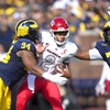 UNLV quarterback Doug Brumfield (2) is sacked by Michigan defensive linemen Kris Jenkins (94) and Kenneth Grant (78) in the first half of an NCAA college football game in Ann Arbor, Mich., Saturday, Sept. 9, 2023.