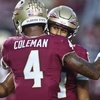 Florida State wide receiver Keon Coleman (4) and quarterback Jordan Travis (13) hug before an NCAA college football game against Southern Mississippi, Saturday, Sept. 9, 2023, in Tallahassee, Fla.