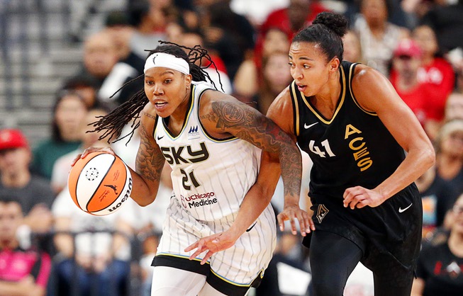 Chicago Sky forward Robyn Parks (21) takes the ball upcourt against Las Vegas Aces center Kiah Stokes (41) during the first half of Game 1 in a first-round WNBA basketball playoff series at T-Mobile Arena Wednesday, Sept. 13, 2023.