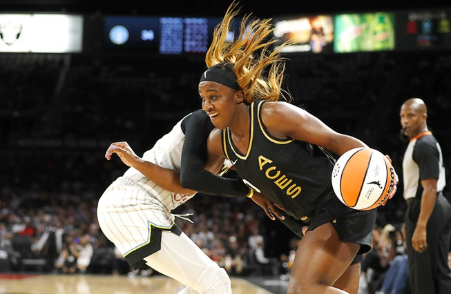 Las Vegas Aces guard Jackie Young (0) drives to the basket during the second half of a Game 2 in a first-round WNBA basketball playoff series against the Chicago Sky at Michelob Ultra Arena in Mandalay Bay Sunday, Sept. 17, 2023.