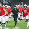 UNLV Rebels head coach Barry Odom runs onto the field with players before an NCAA football game against Vanderbilt at Allegiant Stadium Saturday, Sept. 16, 2023.