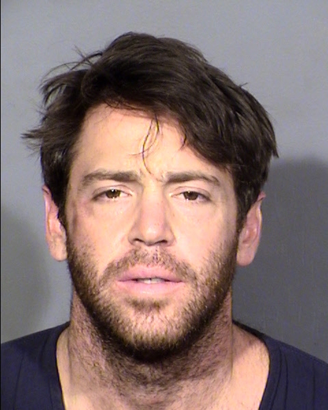 This booking photo provided by the Las Vegas Metropolitan Police Department shows Matthew John Ermond Mannix, of Golden, Colo., following his arrest on Tuesday, July 11, 2023, in Las Vegas. Mannix is accused of holding a woman hostage for several hours barricaded in a 21st floor room at Caesars Palace while furniture was thrown out the window to a swimming pool area below. Mannix also was held on a felony charge of being a fugitive from another state. 


