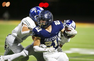 Foothill running back Avant Gates Jr. (21) carries the ball against Green Valley during the second half of a high school football game at Foothill High School in Henderson Friday, Oct. 6, 2023.